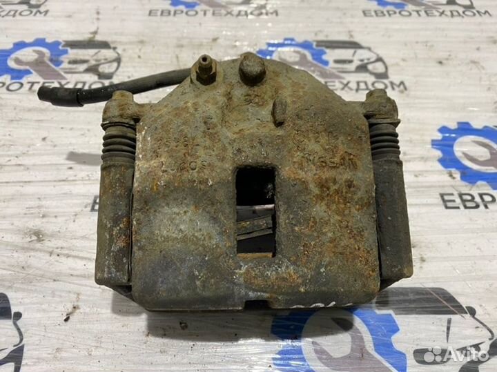 Суппорт передний правый Nissan Primera P12 QG18DE