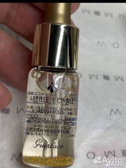 Набор косметики Guerlain в косметичке