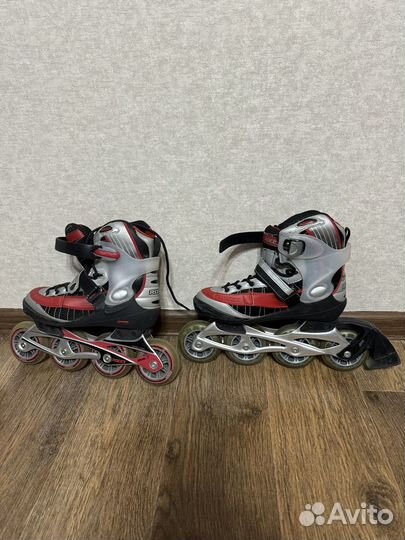 Роликовые коньки