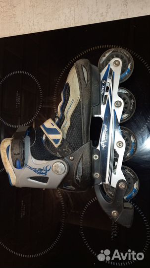 Роликовые коньки