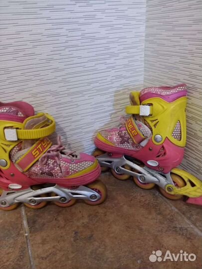 Роликовые коньки