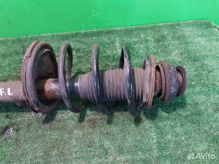 Стойка амортизатора передняя левая Hyundai I20 20