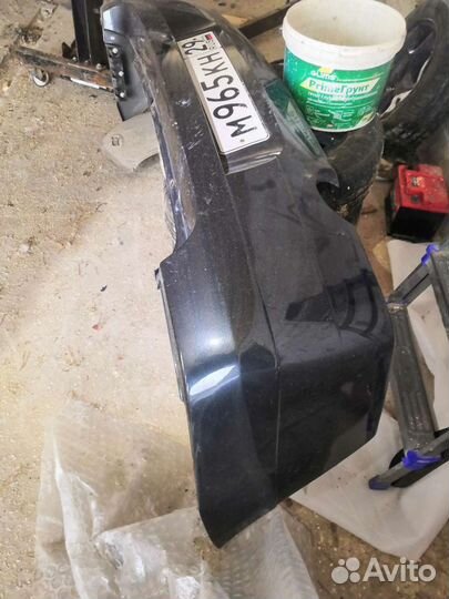 Бампер задний рено логан оригинал серый