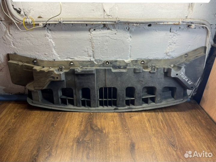 Пыльник переднего бампера передний Nissan Tiida