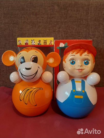 Неваляшки музыкальные и матрёшки в ассортименте