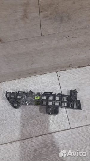 Кронштейн переднего бампера левый Suzuki Vitara С