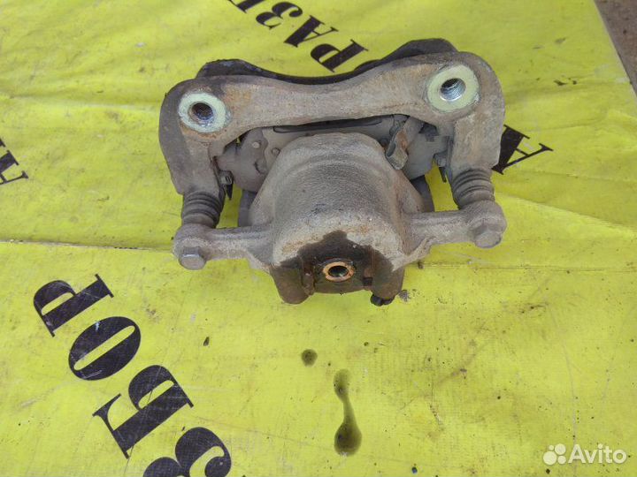 Суппорт передний левый Kia Rio 3 2011-2017 седан