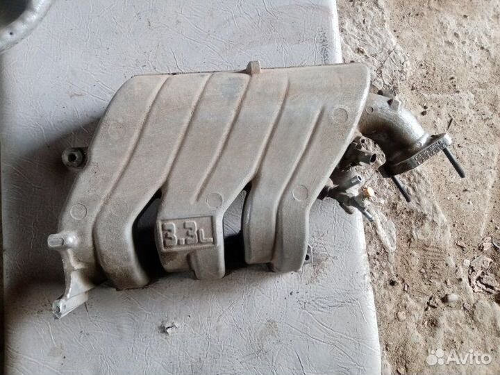 Коллектор впускной Dodge Caravan grand 3.3 1997