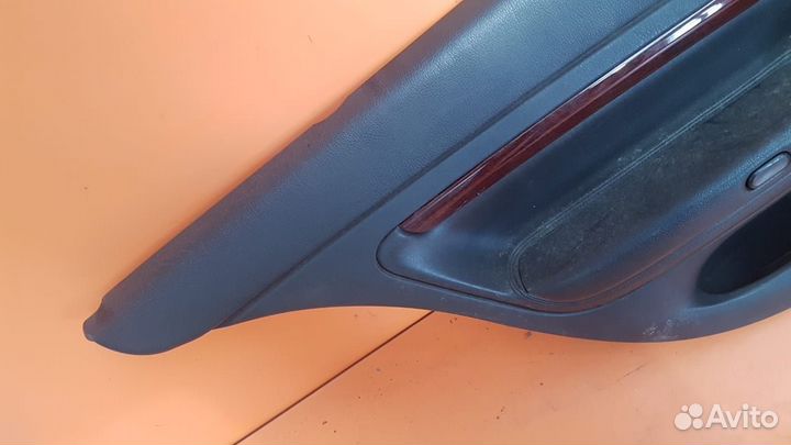 Обшивка задней левой двери на Skoda Superb