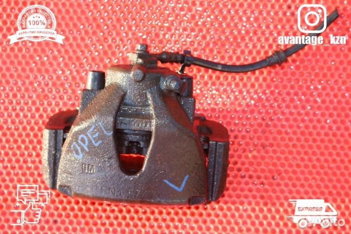 Суппорт тормозной передний левый Opel Astra H