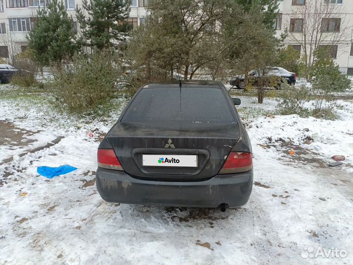 Mitsubishi Lancer 1.3 МТ, 2004, битый, 201 000 км