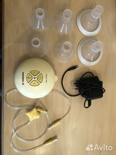 Молокоотсос medela swing maxi