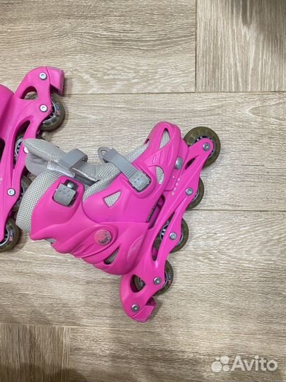 Роликовые коньки reaction