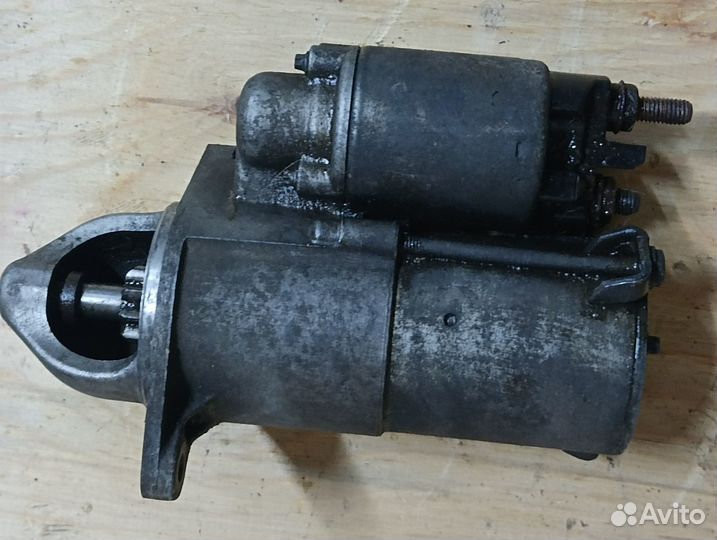 Стартер 55556092 Opel Astra ш