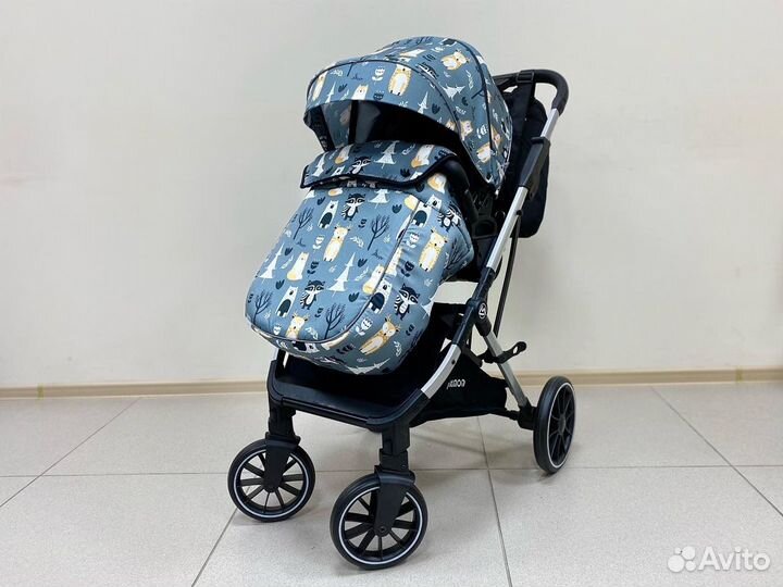Прогулочная коляска с реверсивным блоком