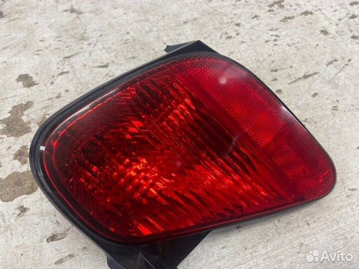 Фонарь противотуманный задний левый Mitsubishi