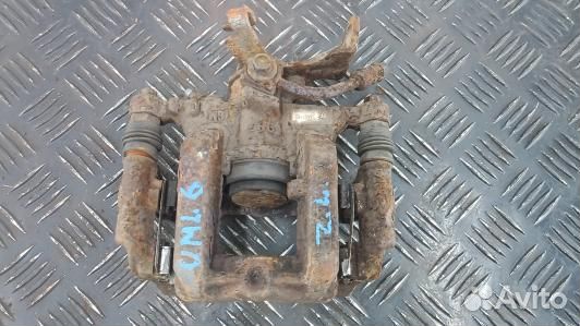 Суппорт тормозной задний левый chevrolet trax (UML06LS01)