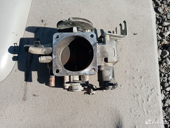 Заслонка дроссельная на Шевроле Эванда 2006