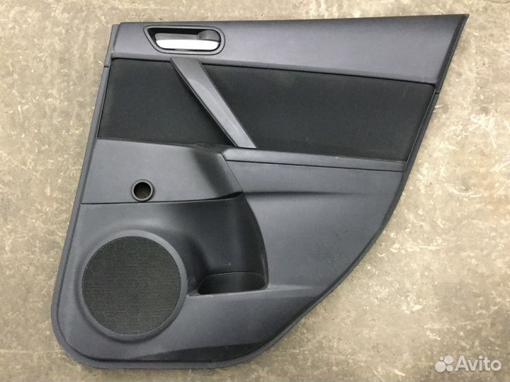 Обшивка двери задней правой Мазда 3 (BL)