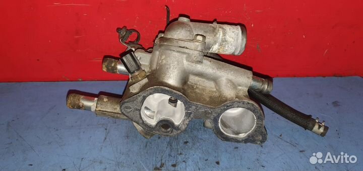 Фланец системы охлаждения Mitsubishi Lancer X 4B11