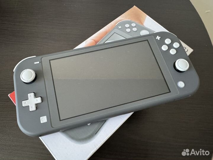 Nintendo switch lite 32GB + The Witcher: Wild Hunt