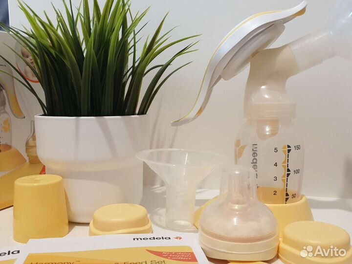 Молокоотсос medela ручной с соской Calma