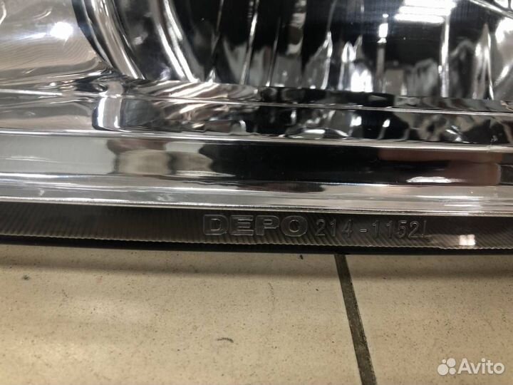 Фара левая Mitsubishi L200 K6,K7 1996-2006