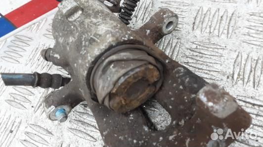 Суппорт тормозной задний правый opel zafira B (JDN