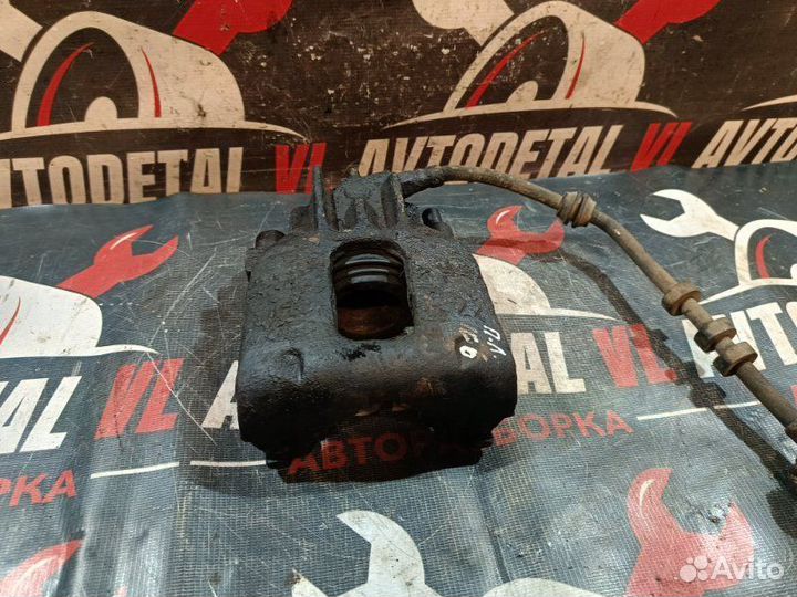 Суппорт тормозной передний левый Ford Focus 1 MK1