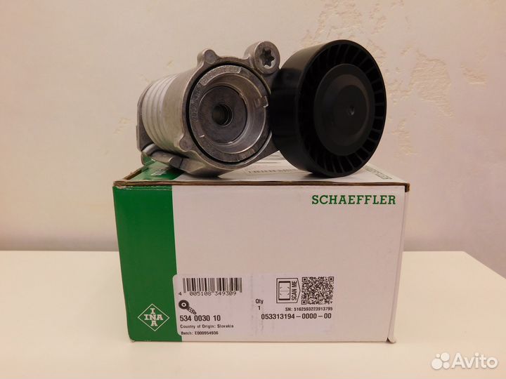 Ролик с натяжителем ремня двс в сборе