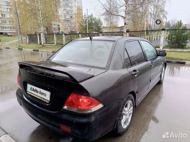 Mitsubishi Lancer 1.6 МТ, 2005, 314 000 км