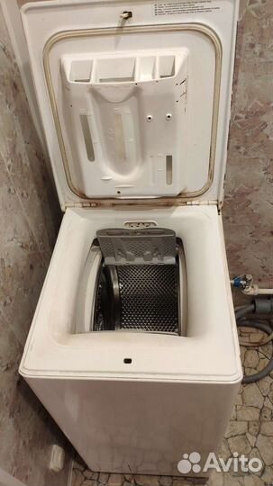Стиральная машина с вертикальной загр electrolux