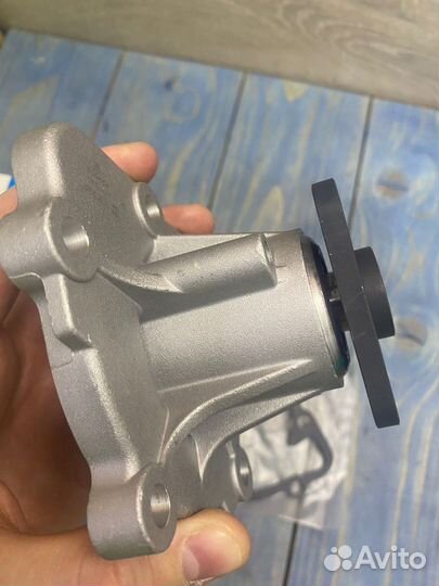 Помпа водяная Hyundai ix35, SantaFe 2, Sonata