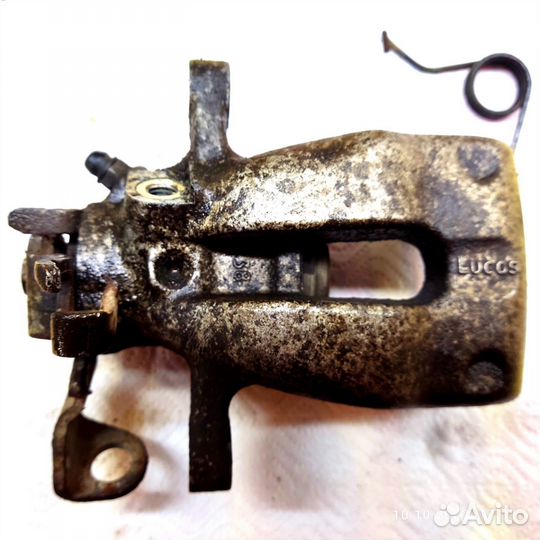 Суппорт тормозной задний Опель Астра Н рест