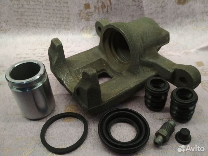 Суппорт задний правый шевроле лачетти