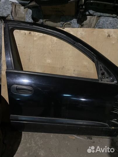 Дверь передняя Nissan almera n16