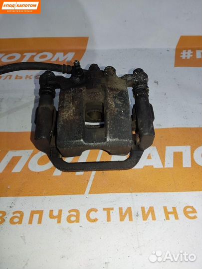 Суппорт тормозной задний левый Nissan X-Trail T31