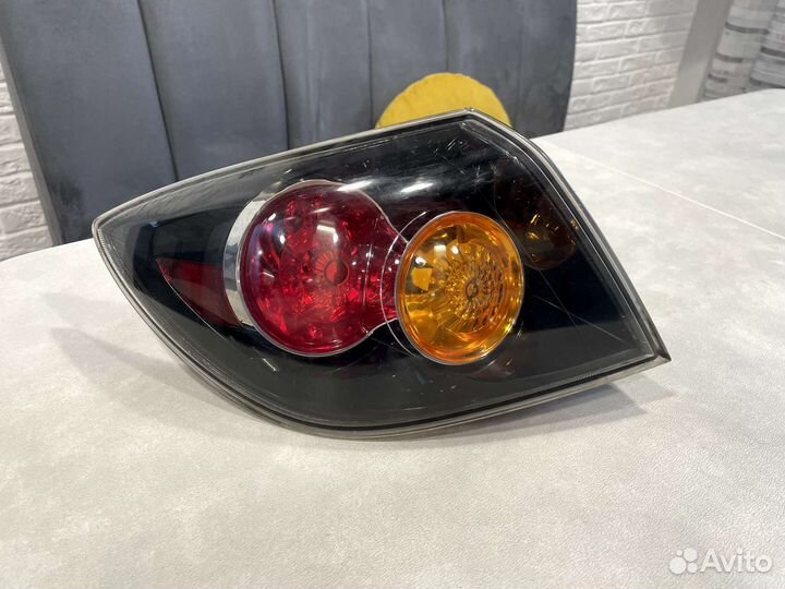 Фонарь задний левый в крыло mazda 3