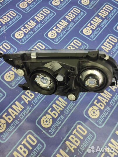 Фара передняя левая Toyota Ipsum SXM10