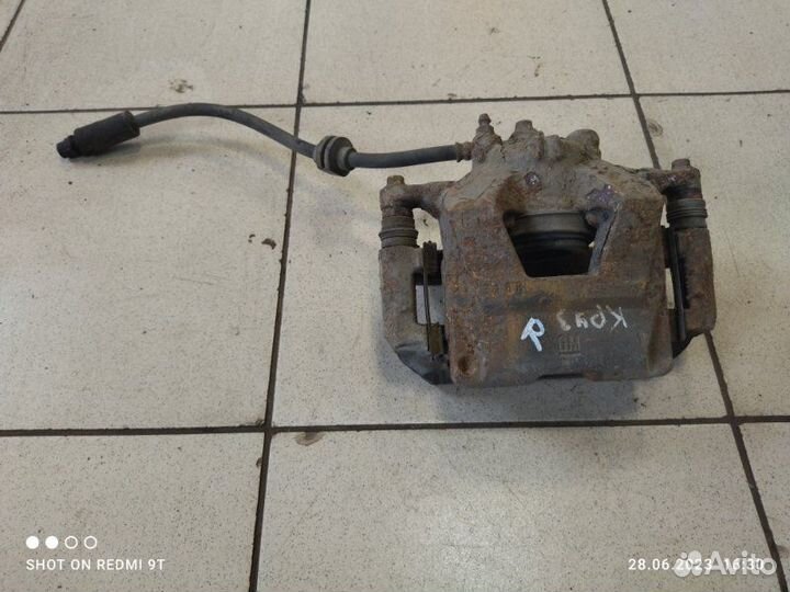 Суппорт тормозной передний правый Chevrolet Cruze