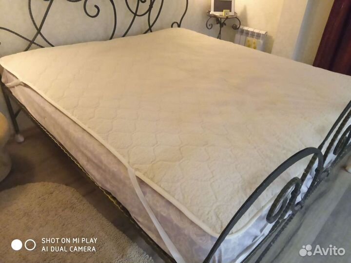 Наматрасник двусторонний 200 на 180 см