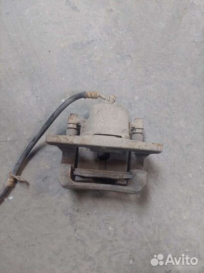 Суппорт передний Mitsubishi Outlander XL