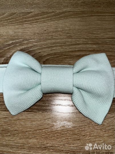 Вязаный бант на конверт для выписки