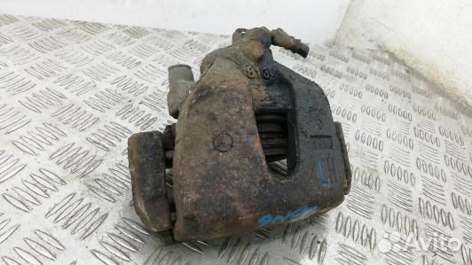 Суппорт тормозной передний левый mazda 3 2 (LBN06K