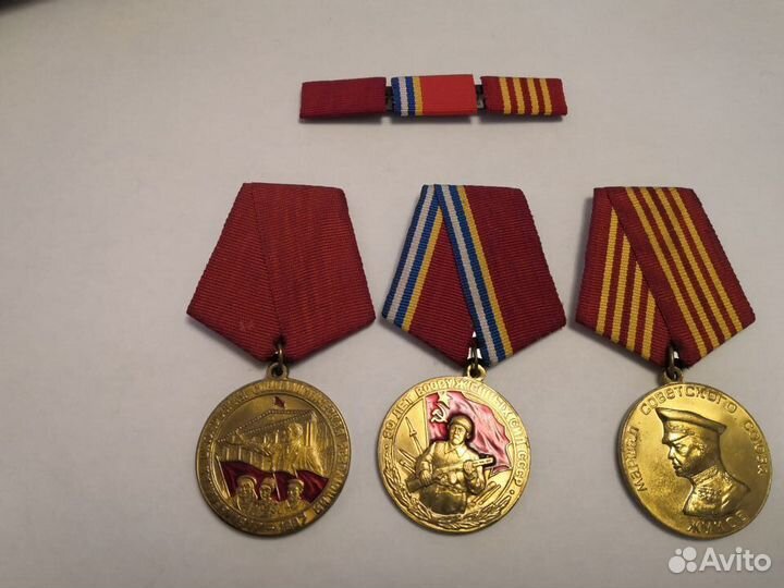 Медали Умалатовой