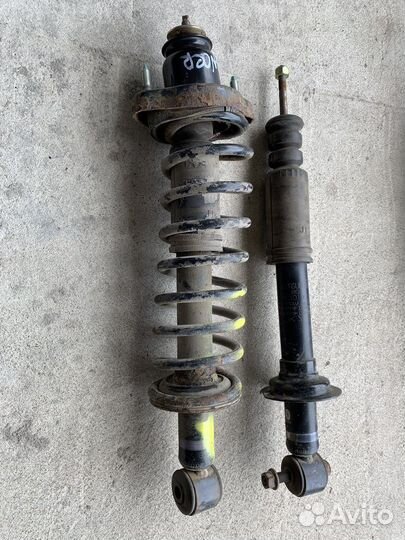 Стойка пружина задняя Mitsubishi Lancer 9