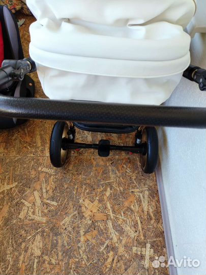 Коляска адамакс
