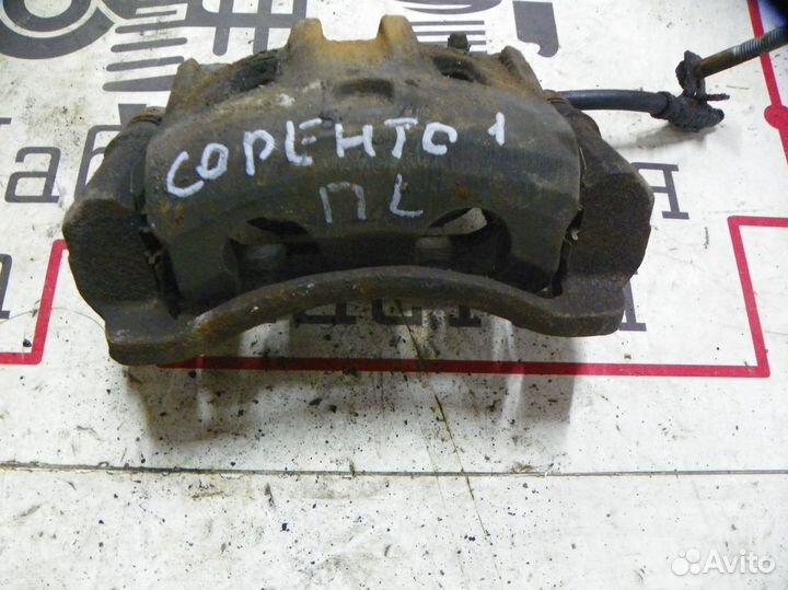 Суппорт тормозной передний левый Kia Sorento