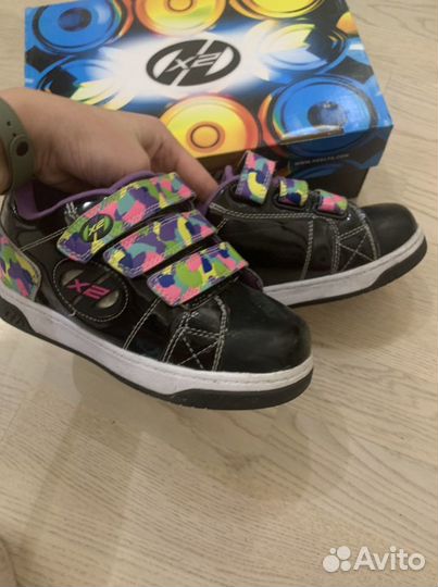 Кроссовки роликовые