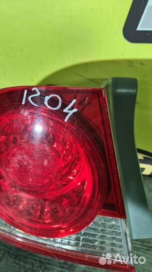 Фонарь заднего хода задний левый Honda Civic 4D